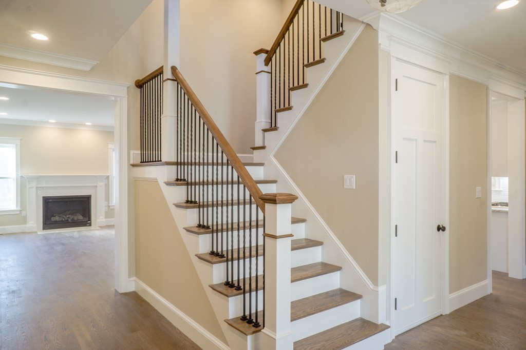 322 Maynard Road Sudbury, MA 01776 - Photo 4 of 24 a view of entryway and hall with wooden floor