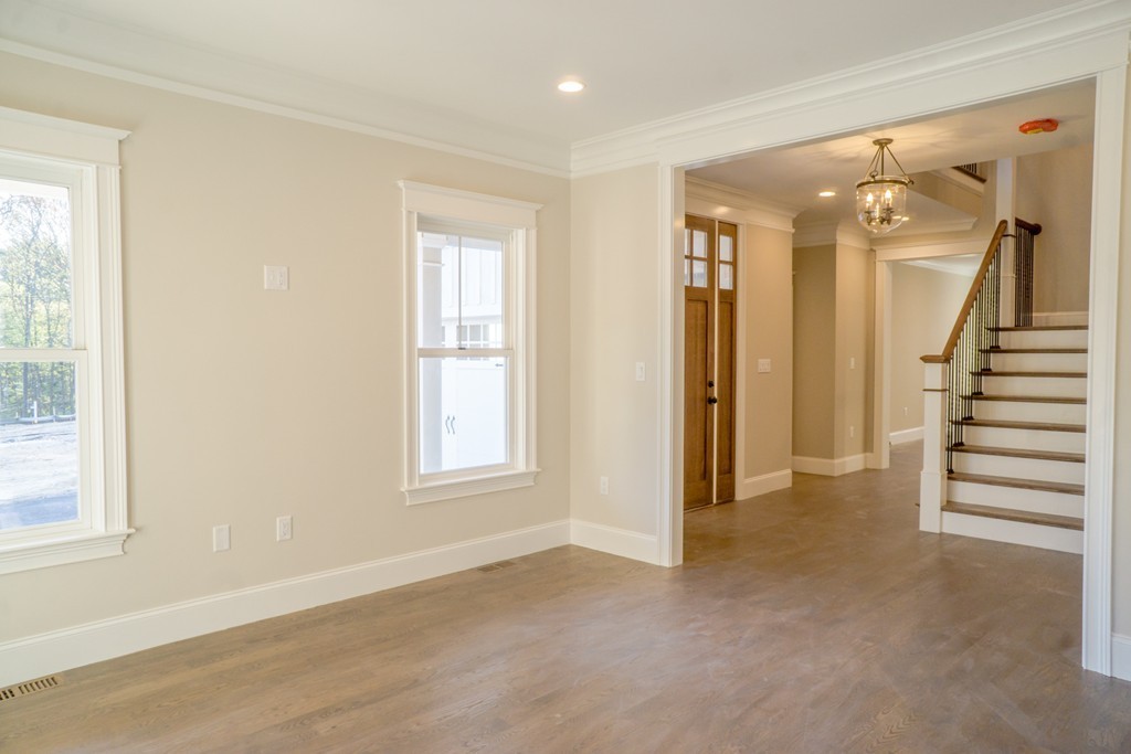 322 Maynard Road Sudbury, MA 01776 - Photo 6 of 24 an empty room with windows and entryway