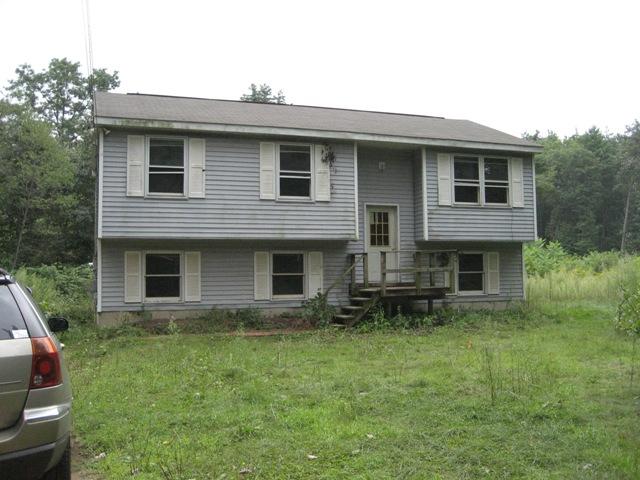 199 Polikoff Road Sheffield, MA 01222 - Photo 1 of 10 a house view with a garden space