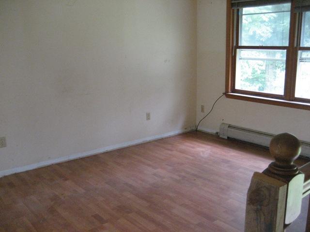 199 Polikoff Road Sheffield, MA 01222 - Photo 4 of 10 an empty room with a window