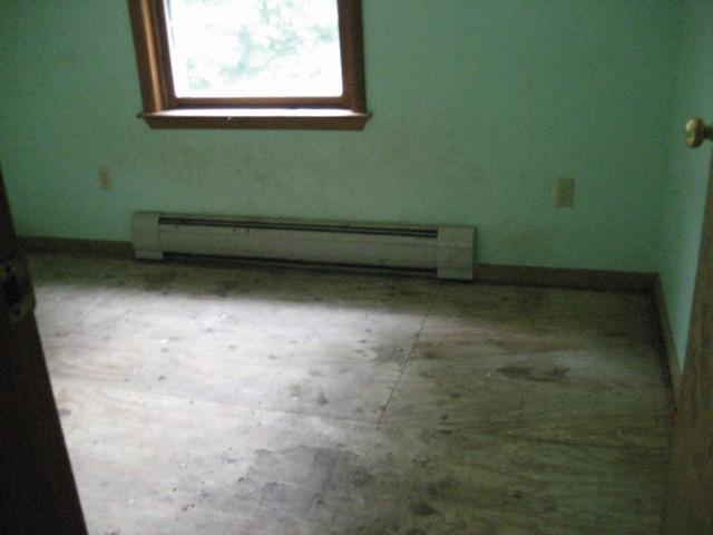 199 Polikoff Road Sheffield, MA 01222 - Photo 7 of 10 a view of a small space with wooden floor and a window
