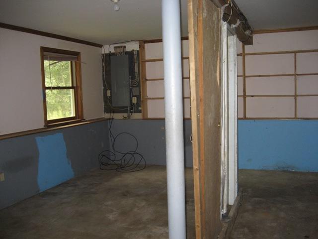199 Polikoff Road Sheffield, MA 01222 - Photo 8 of 10 an empty room with windows