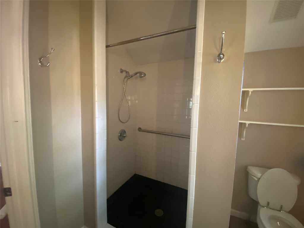3300 Lafayette Avenue, Unit B Austin, TX 78722 - Photo 12 of 13 Full bathroom with a shower stall