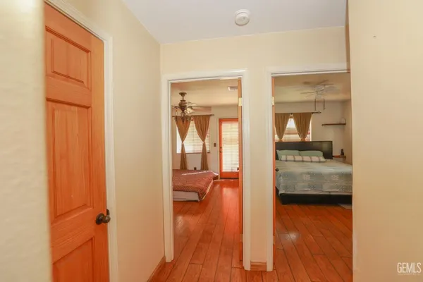 a view of walk in closet with living room