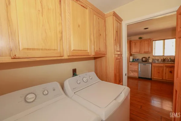 a utility room with washer and dryer