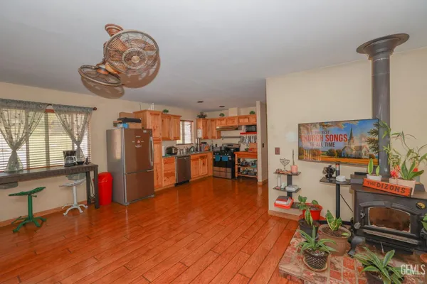 a view of a room with workspace and toys