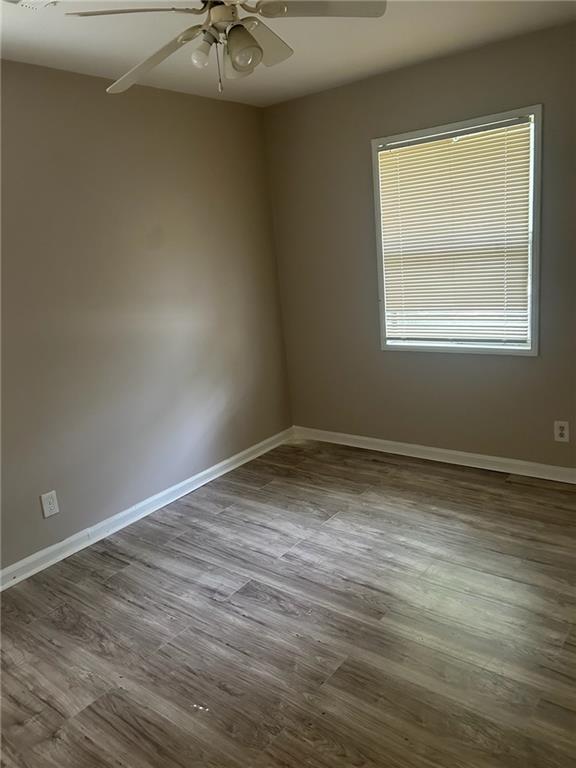 2418 Adger Road Macon, GA 31206 - Photo 4 of 5 a view of an empty room with a window