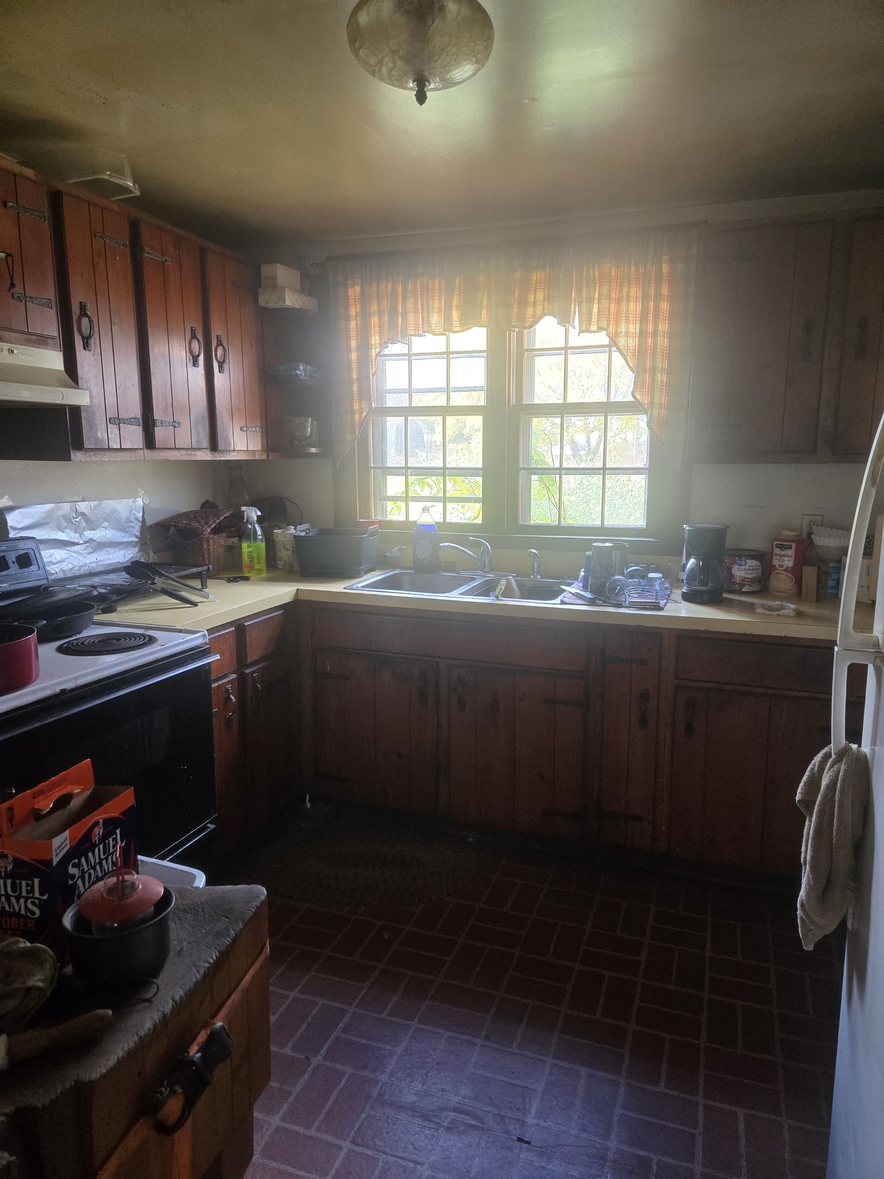 29 General Lyon Road Eastford, CT 06242 - Photo 8 of 9 a kitchen with a sink stove and cabinets