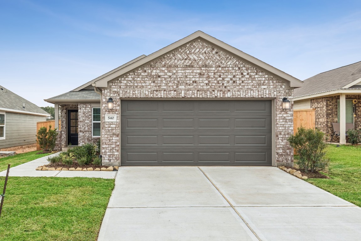540 Flower Reed Court Magnolia, TX 77354 - Photo 11 of 45 a view of barn with a small yard