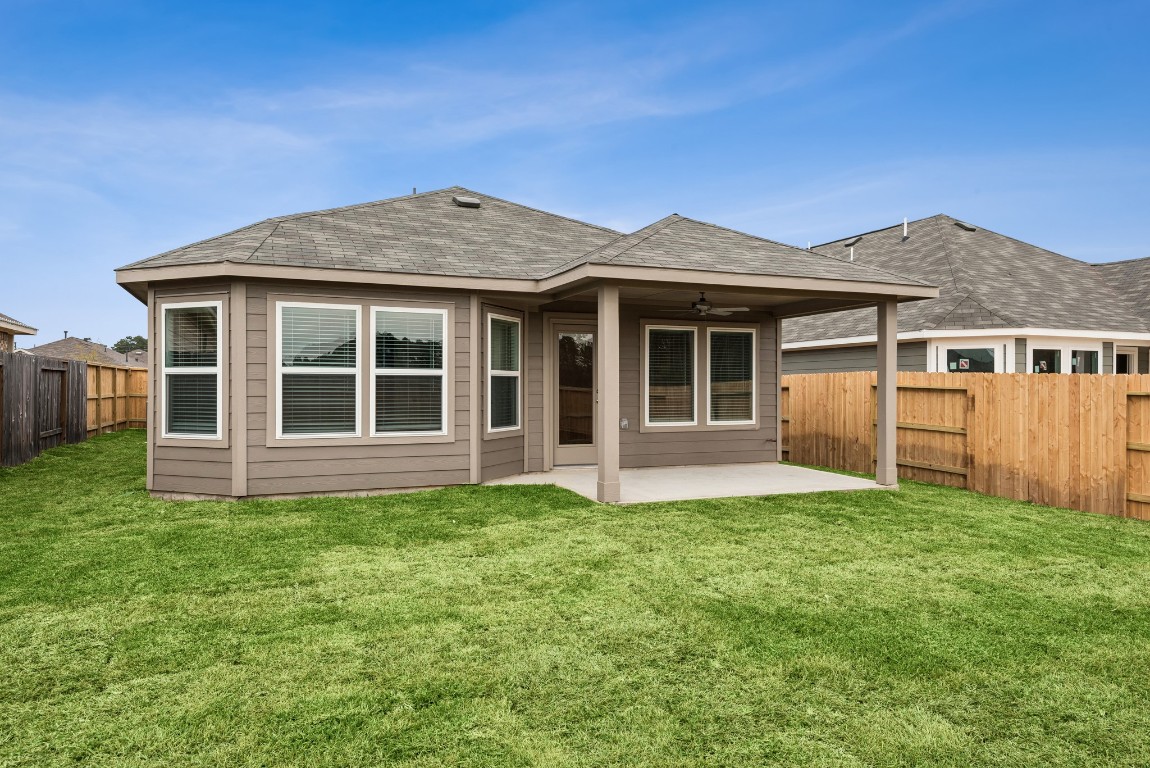 540 Flower Reed Court Magnolia, TX 77354 - Photo 14 of 45 a house view with a garden space