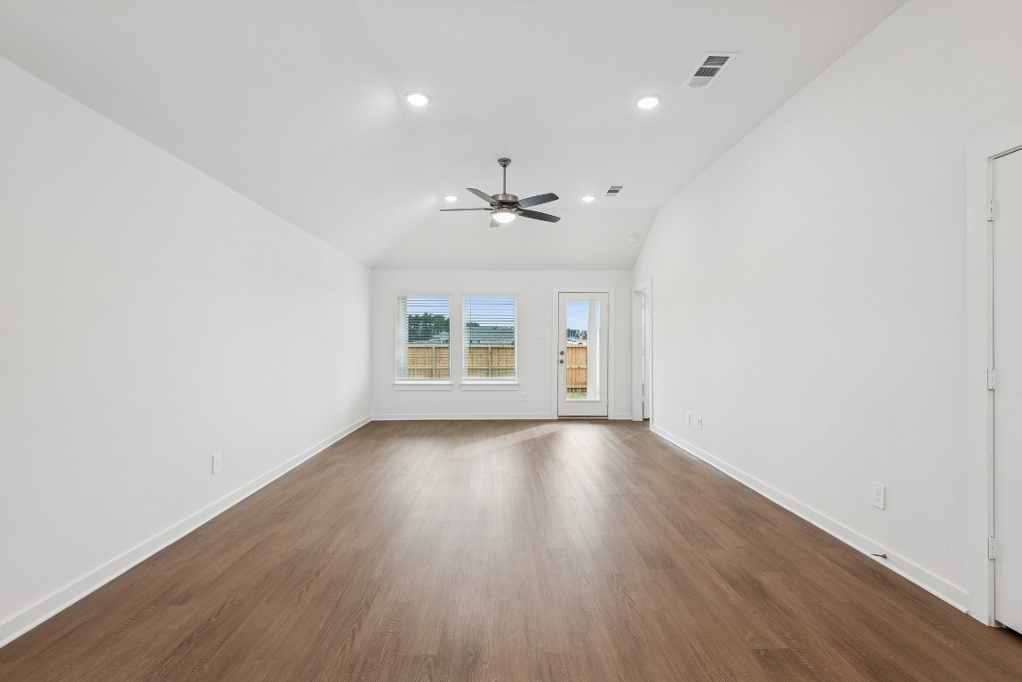 540 Flower Reed Court Magnolia, TX 77354 - Photo 23 of 45 wooden floor in an empty room with a window