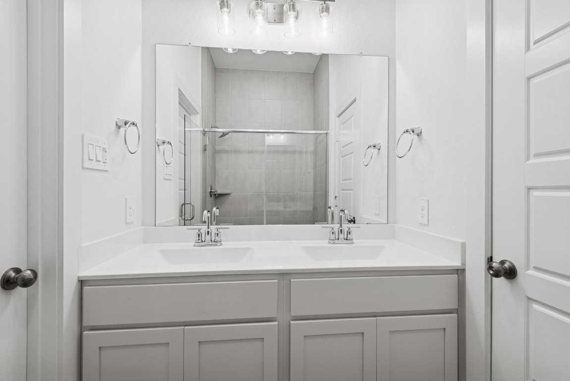 540 Flower Reed Court Magnolia, TX 77354 - Photo 37 of 45 a bathroom with a sink and a mirror
