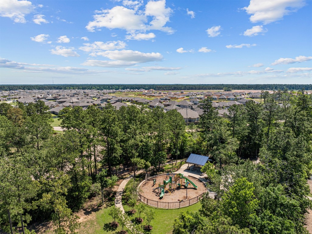540 Flower Reed Court Magnolia, TX 77354 - Photo 43 of 45 a view of a swimming pool with a yard