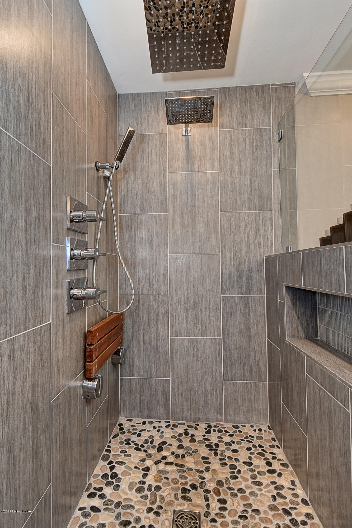1315 Autumn Ridge Road Louisville, KY 40242 - Photo 20 of 39 2 shower heads and a seat. Updated in 2012.