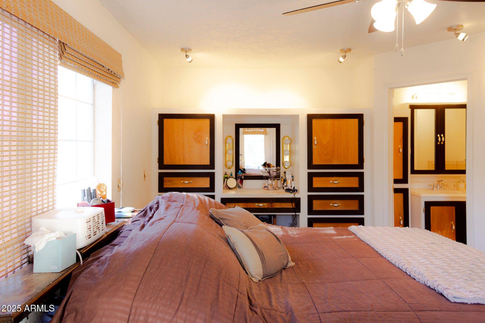 3510 East Maybe Manana Way Rimrock, AZ 86335 - Photo 12 of 36 a bedroom with a bed and a large mirror