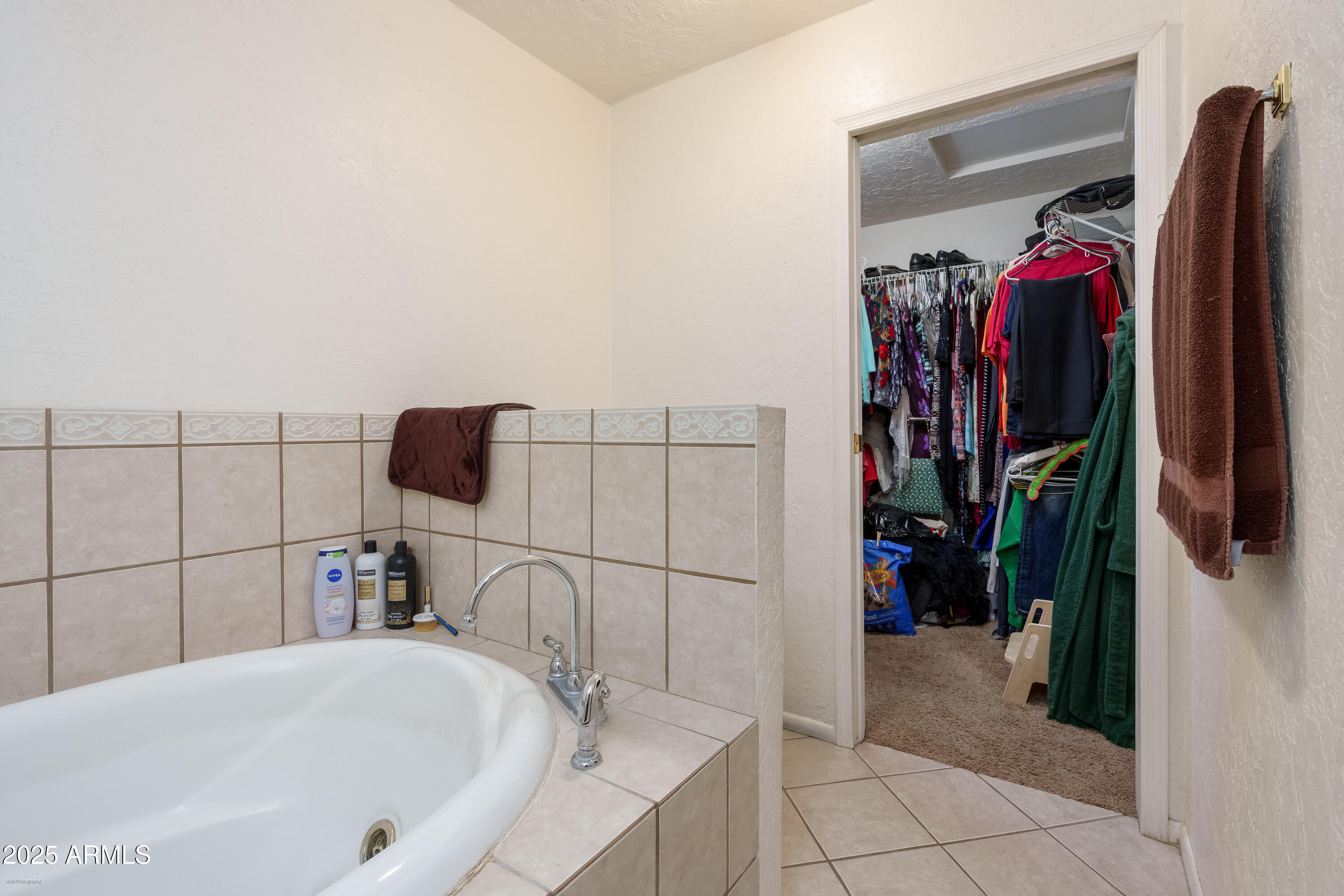 3510 East Maybe Manana Way Rimrock, AZ 86335 - Photo 15 of 36 a bathroom with a tub and a shower