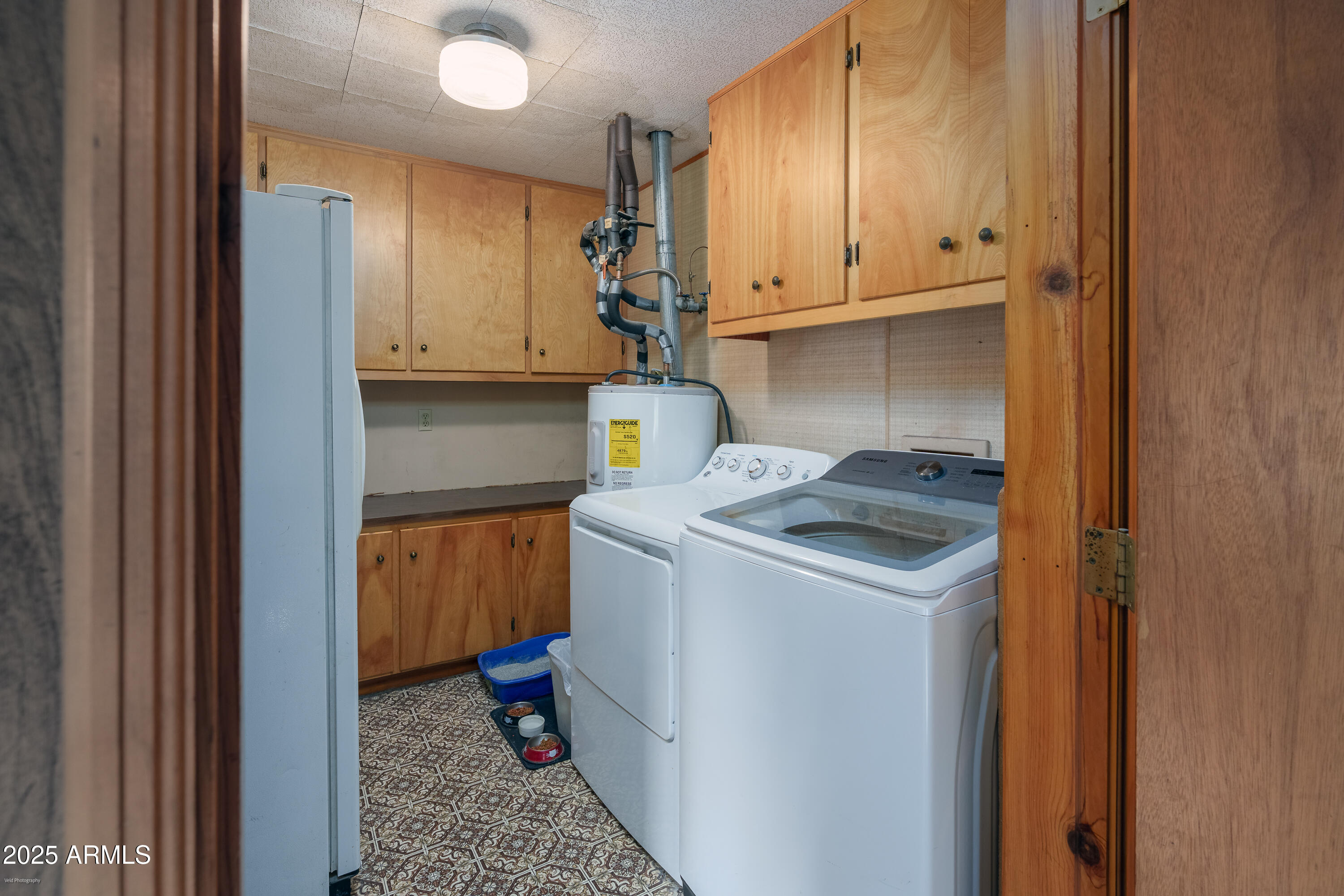 3510 East Maybe Manana Way Rimrock, AZ 86335 - Photo 25 of 36 a utility room with dryer and washer