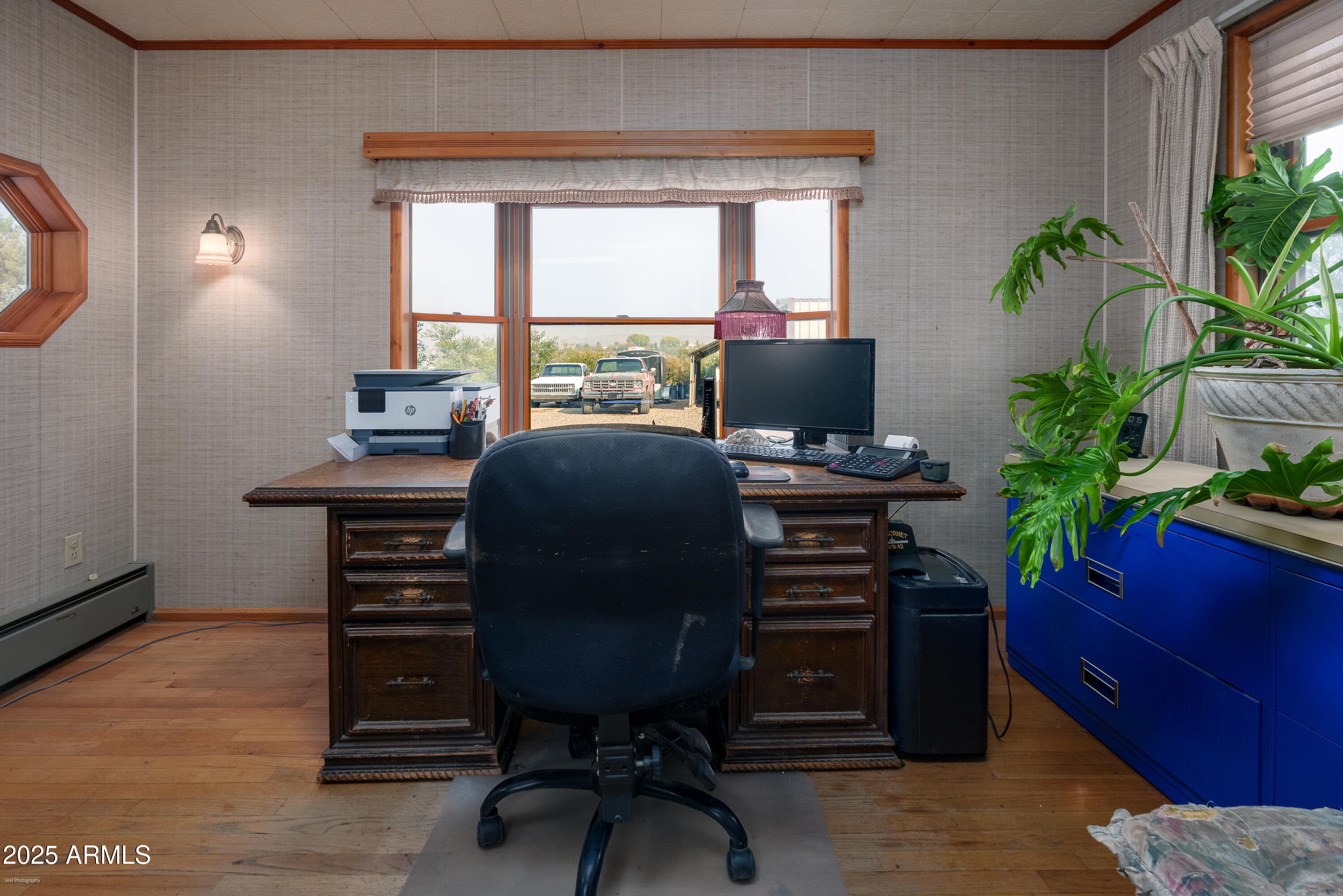 3510 East Maybe Manana Way Rimrock, AZ 86335 - Photo 7 of 36 a view of a workspace with furniture and a window