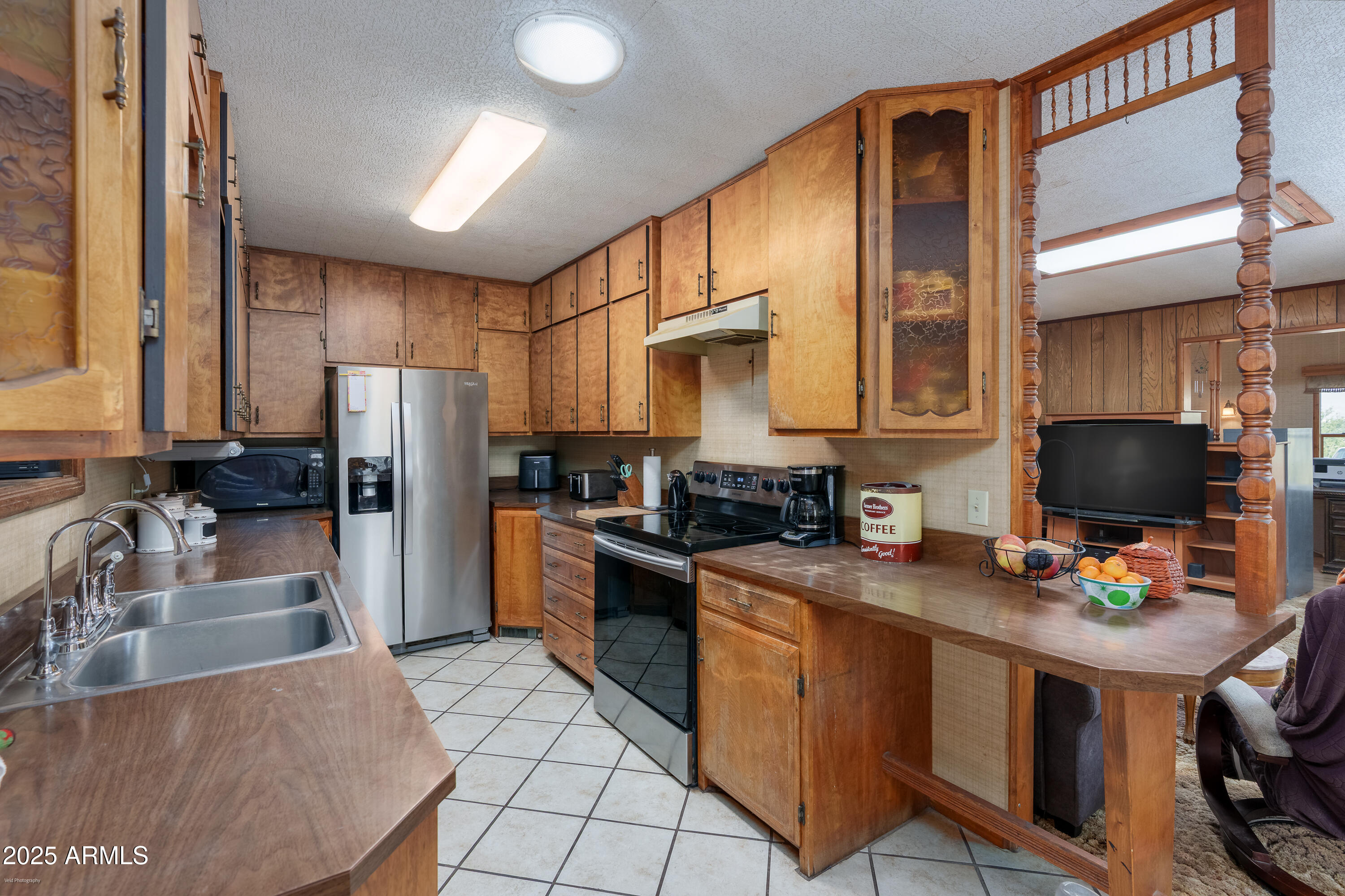 3510 East Maybe Manana Way Rimrock, AZ 86335 - Photo 8 of 36 a kitchen with stainless steel appliances granite countertop a refrigerator stove and sink