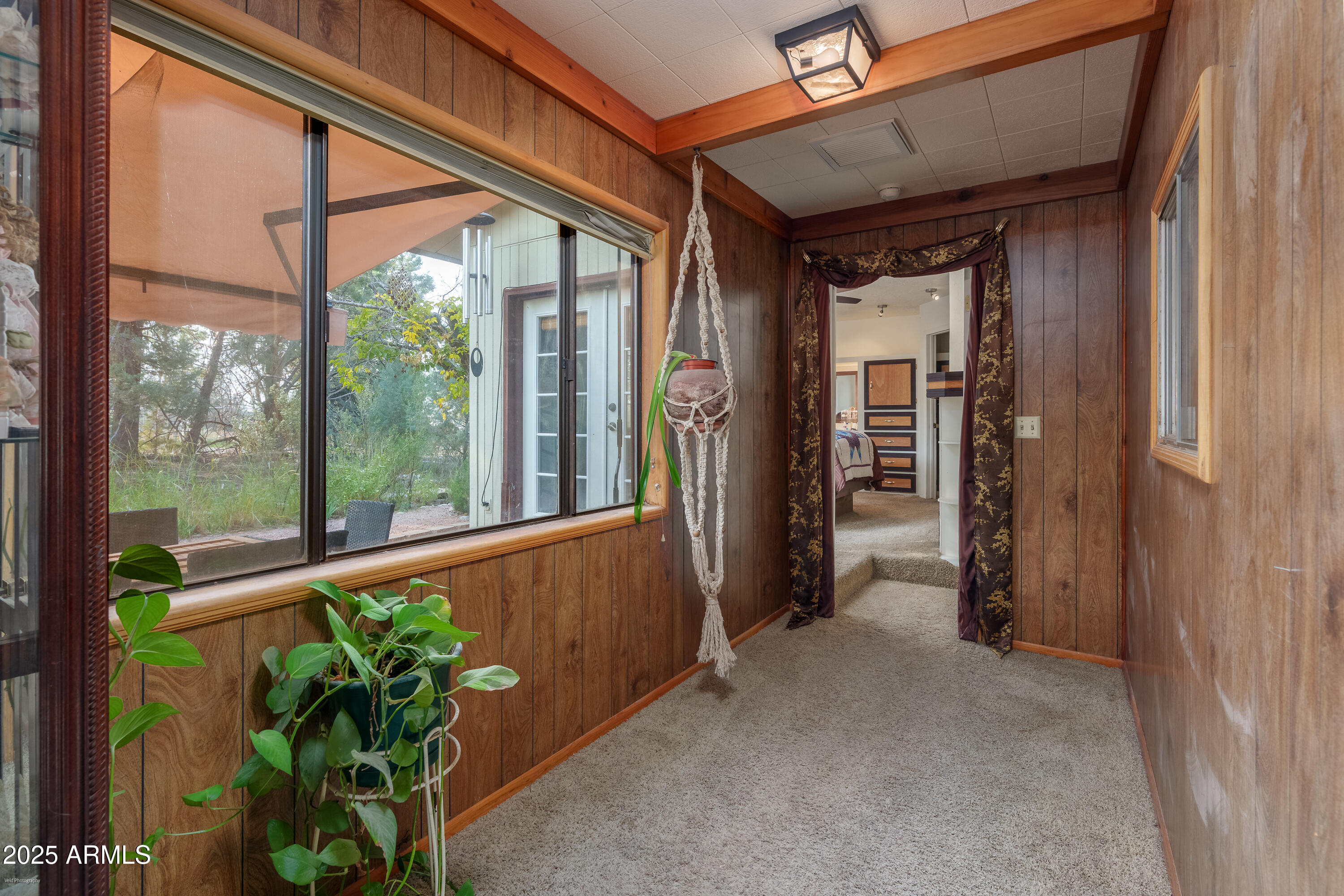 3510 East Maybe Manana Way Rimrock, AZ 86335 - Photo 10 of 36 a view of a hallway with wooden floor