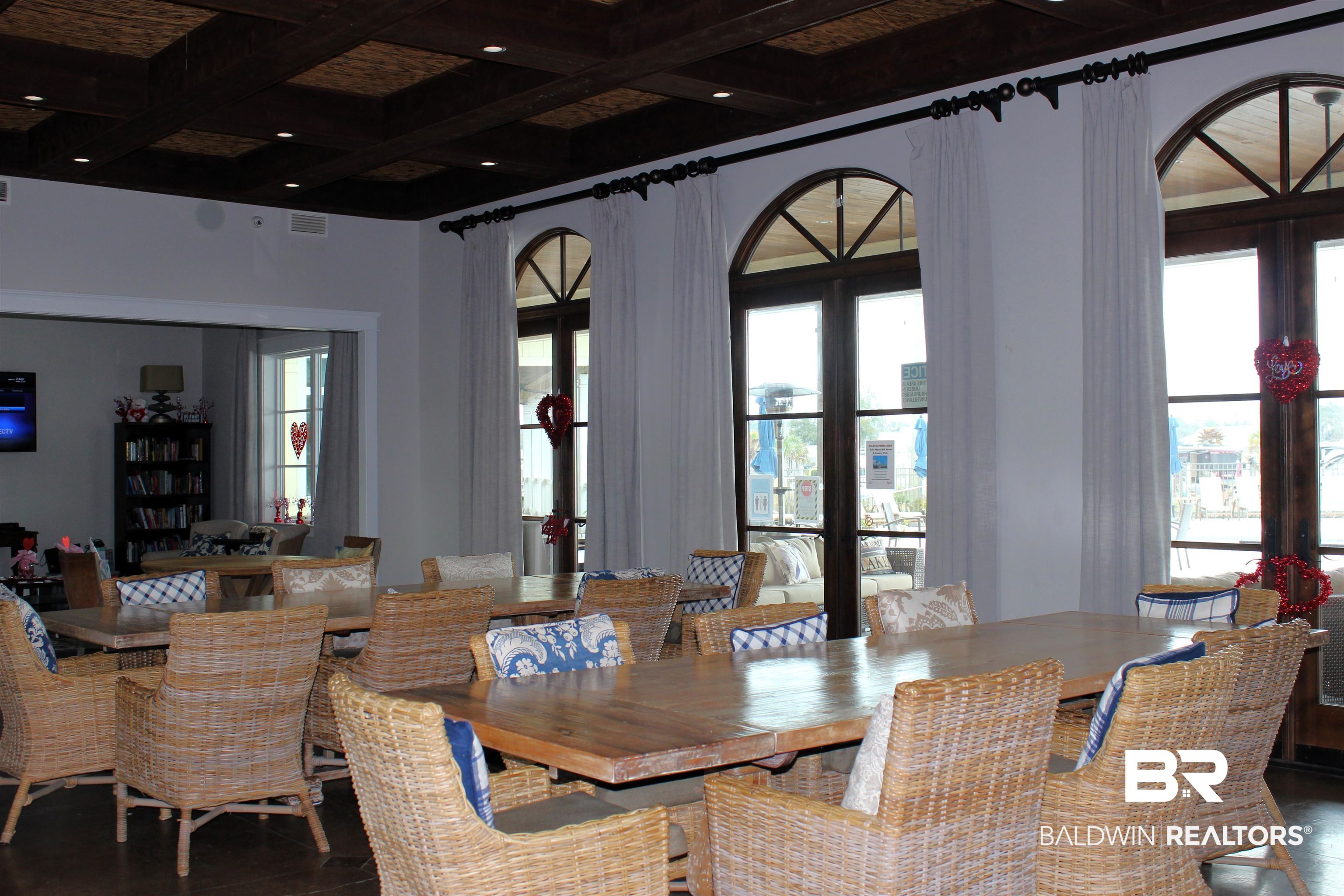 11869 Gateway Drive Elberta, AL 36530 - Photo 14 of 78 Dining space featuring visible vents, hardwood / wood-style floors, coffered ceiling, and beamed ceiling