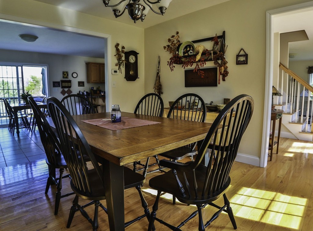 501 Oakham Road Barre, MA 01005 - Photo 3 of 25 a view of a a dining room with furniture and wooden floor