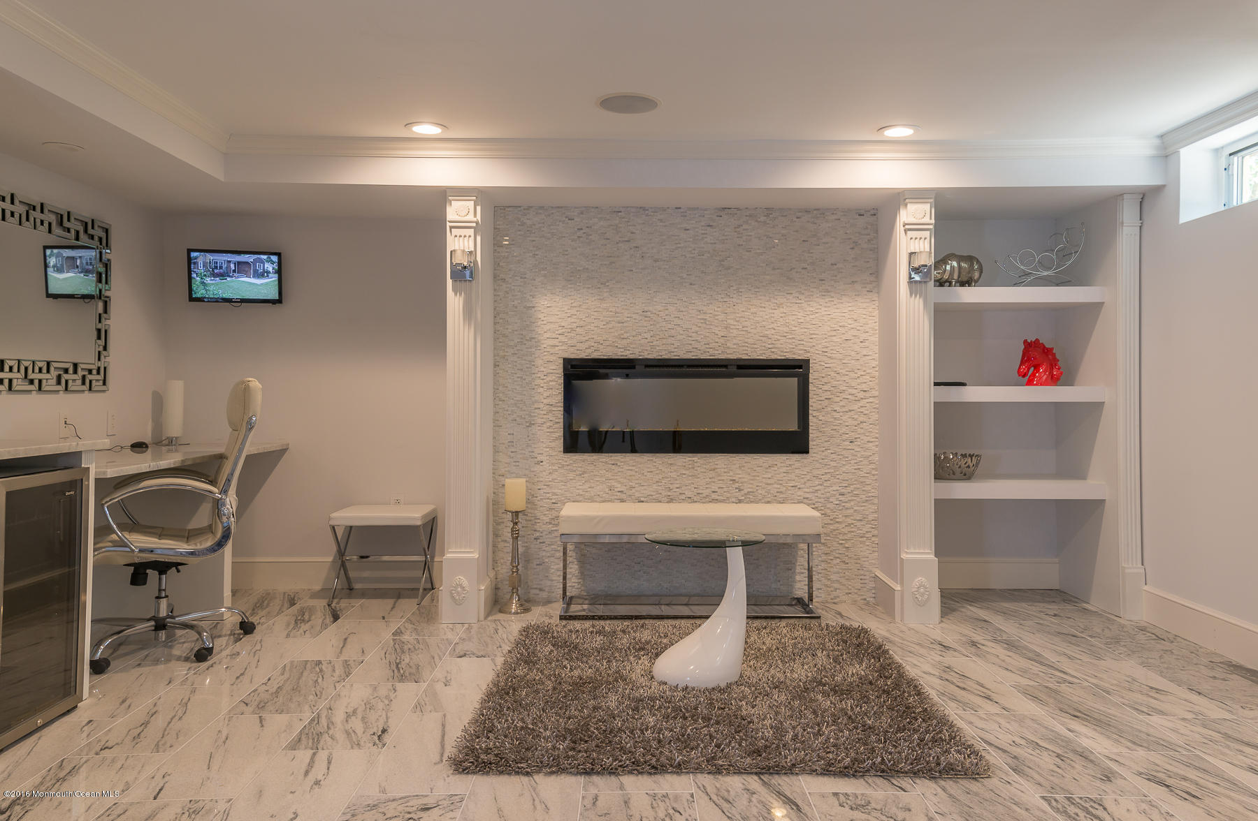 17 Heyers Mill Road Colts Neck, NJ 07722 - Photo 15 of 26 a living room with a couch and a coffee table