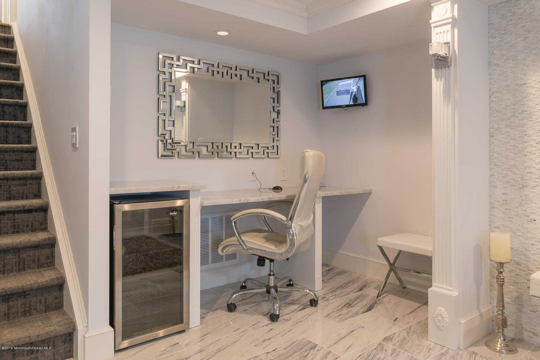 17 Heyers Mill Road Colts Neck, NJ 07722 - Photo 18 of 26 a view of a workspace with furniture and a window