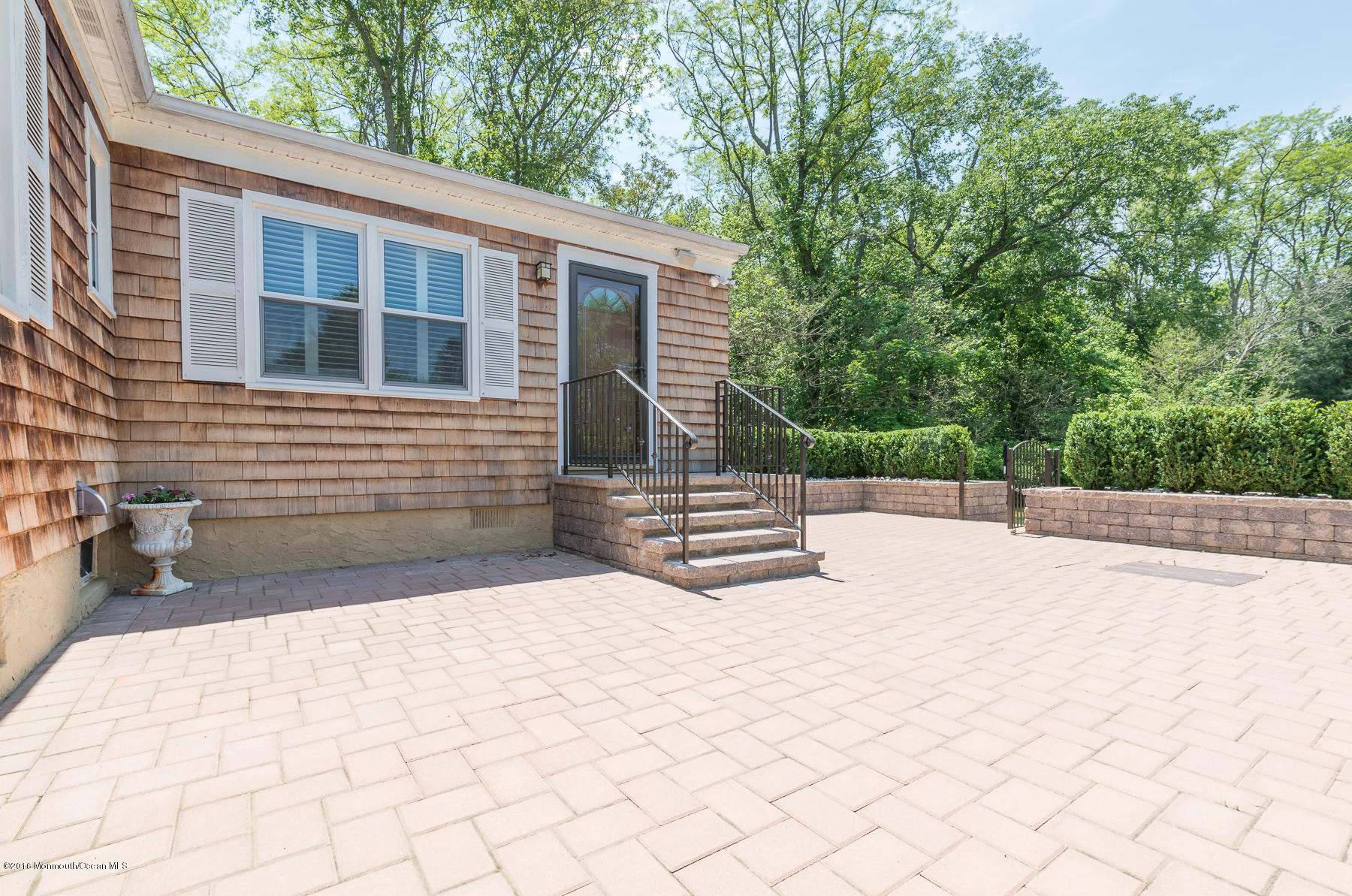 17 Heyers Mill Road Colts Neck, NJ 07722 - Photo 19 of 26 a view of backyard with a chair