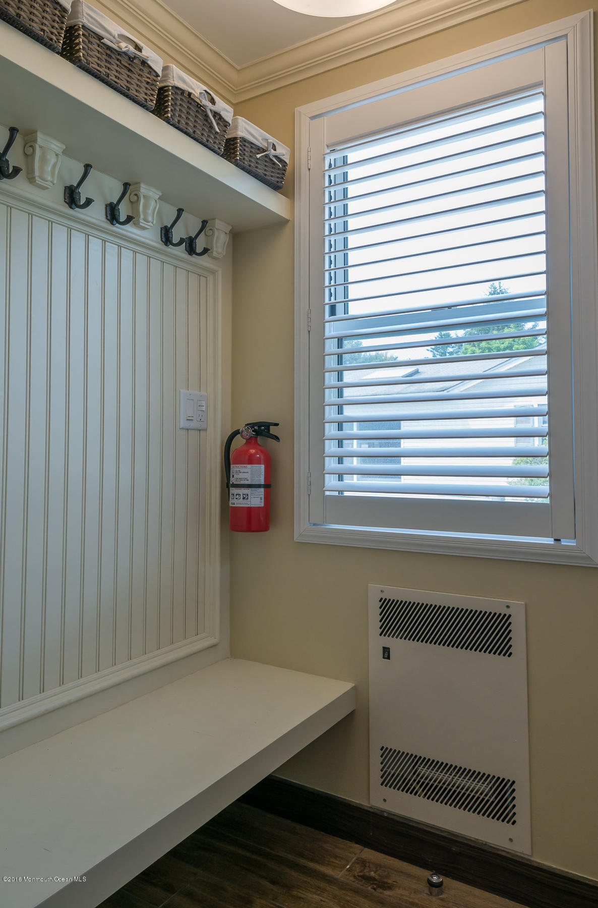 17 Heyers Mill Road Colts Neck, NJ 07722 - Photo 26 of 26 a view of a room with rack on the wall and a window