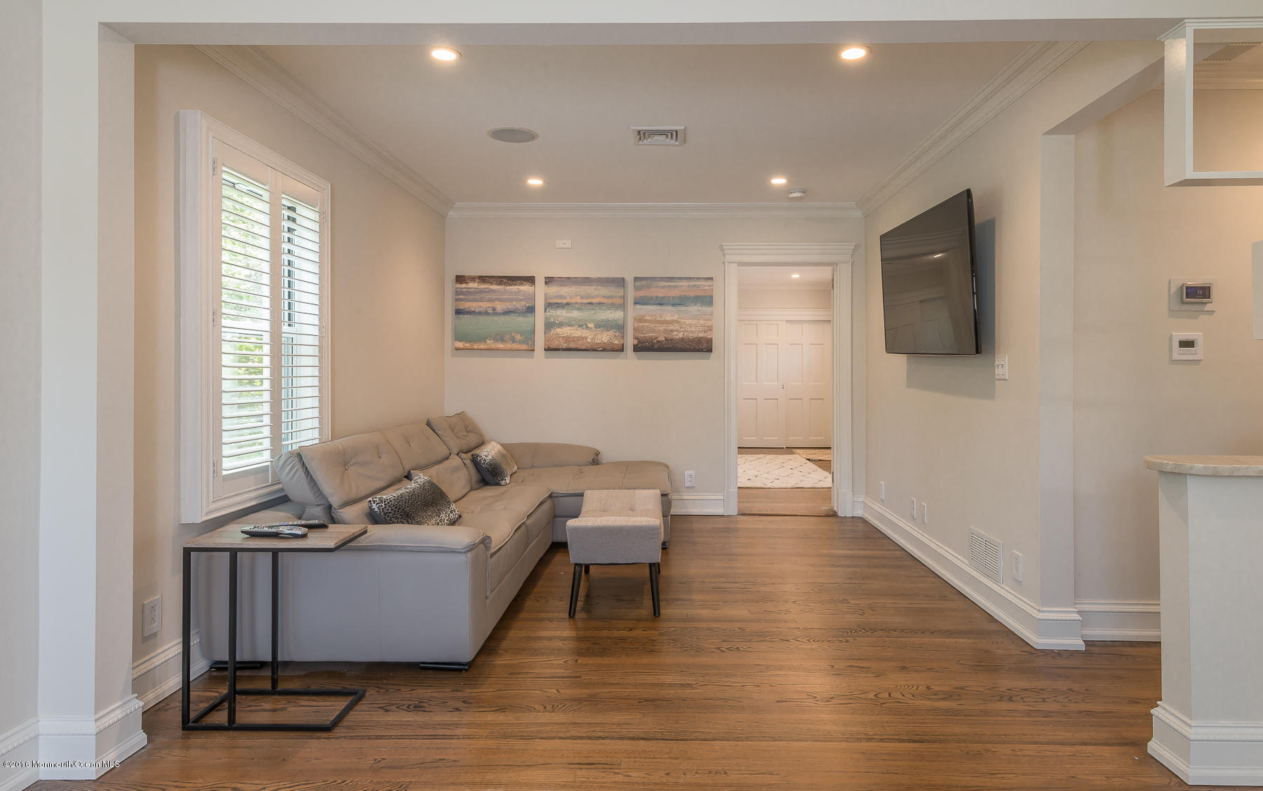 17 Heyers Mill Road Colts Neck, NJ 07722 - Photo 6 of 26 a living room with furniture and a wooden floor