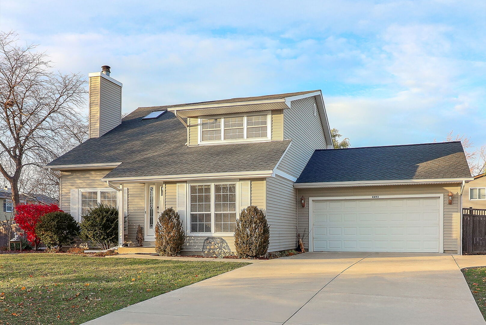 4493 Capstan Drive Hoffman Estates, IL 60192 - Photo 2 of 26 a front view of a house with a yard