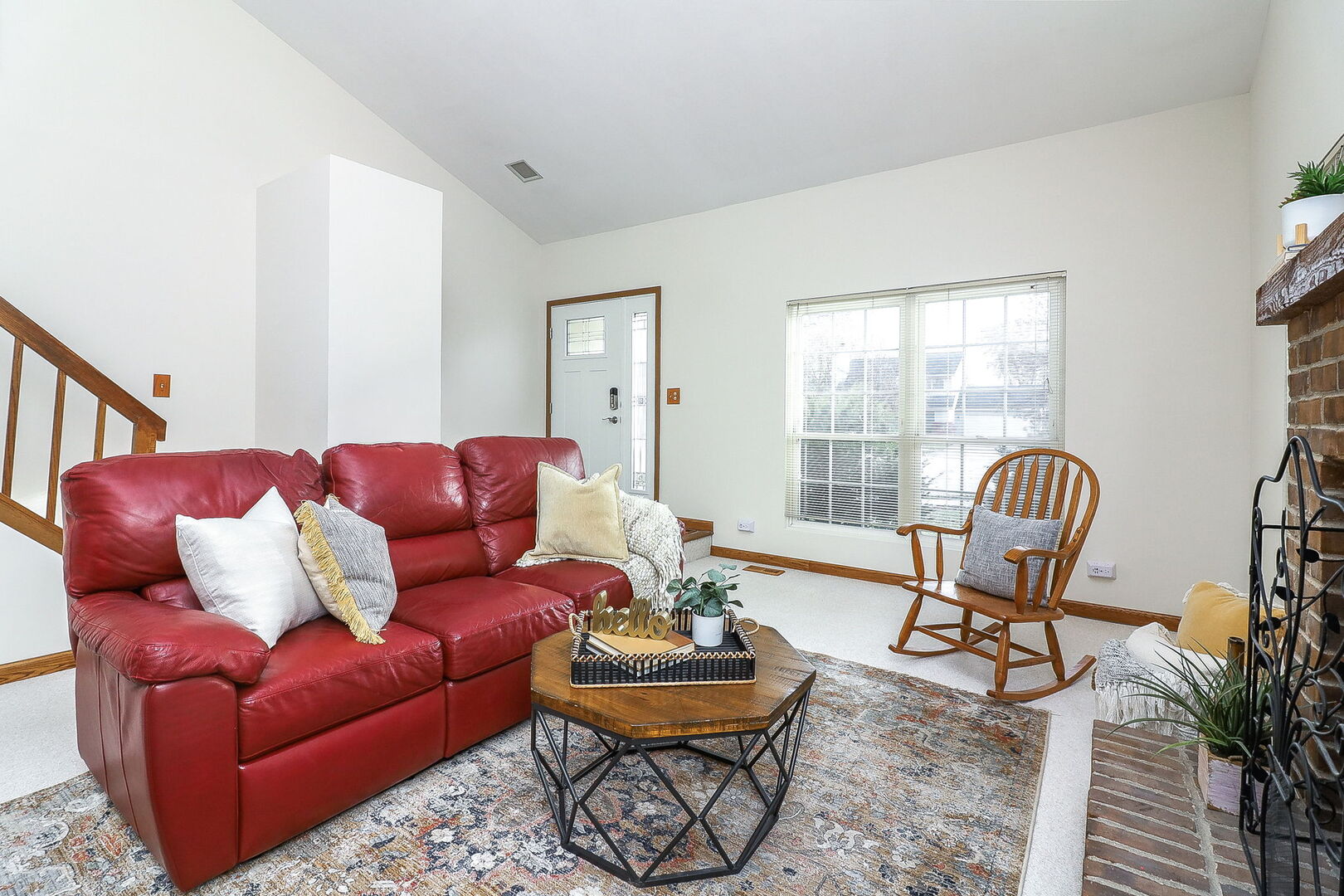 4493 Capstan Drive Hoffman Estates, IL 60192 - Photo 6 of 26 a living room with furniture a rug and a window
