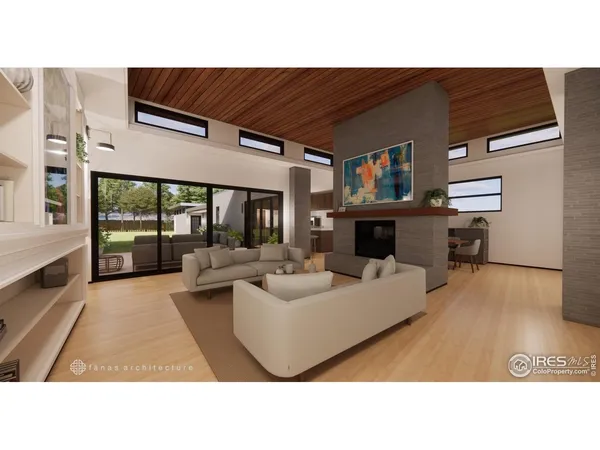 a living room with furniture a large window and a fireplace