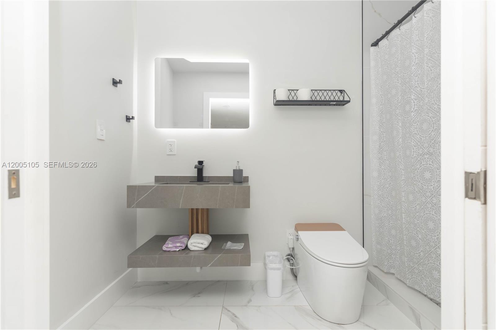 2360 Southwest 12th Street Miami, FL 33135 - Photo 35 of 54 a bathroom with a toilet