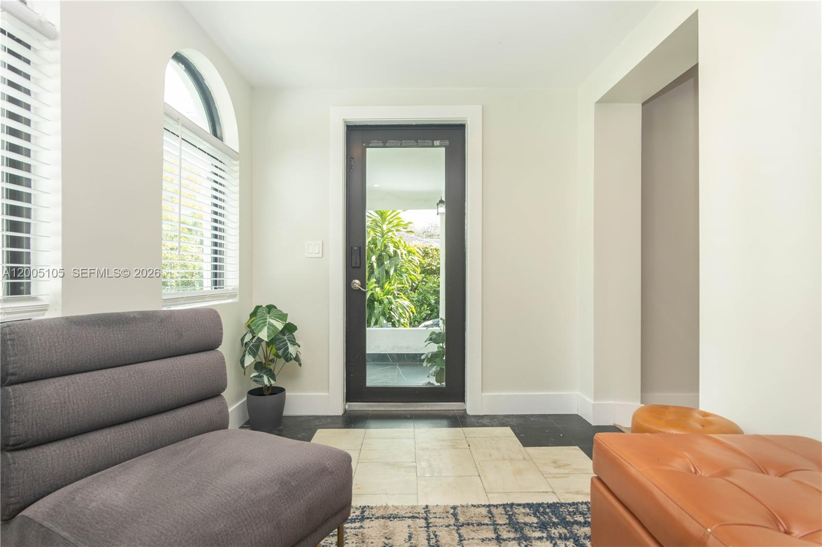 2360 Southwest 12th Street Miami, FL 33135 - Photo 45 of 54 a living room with furniture and a potted plant