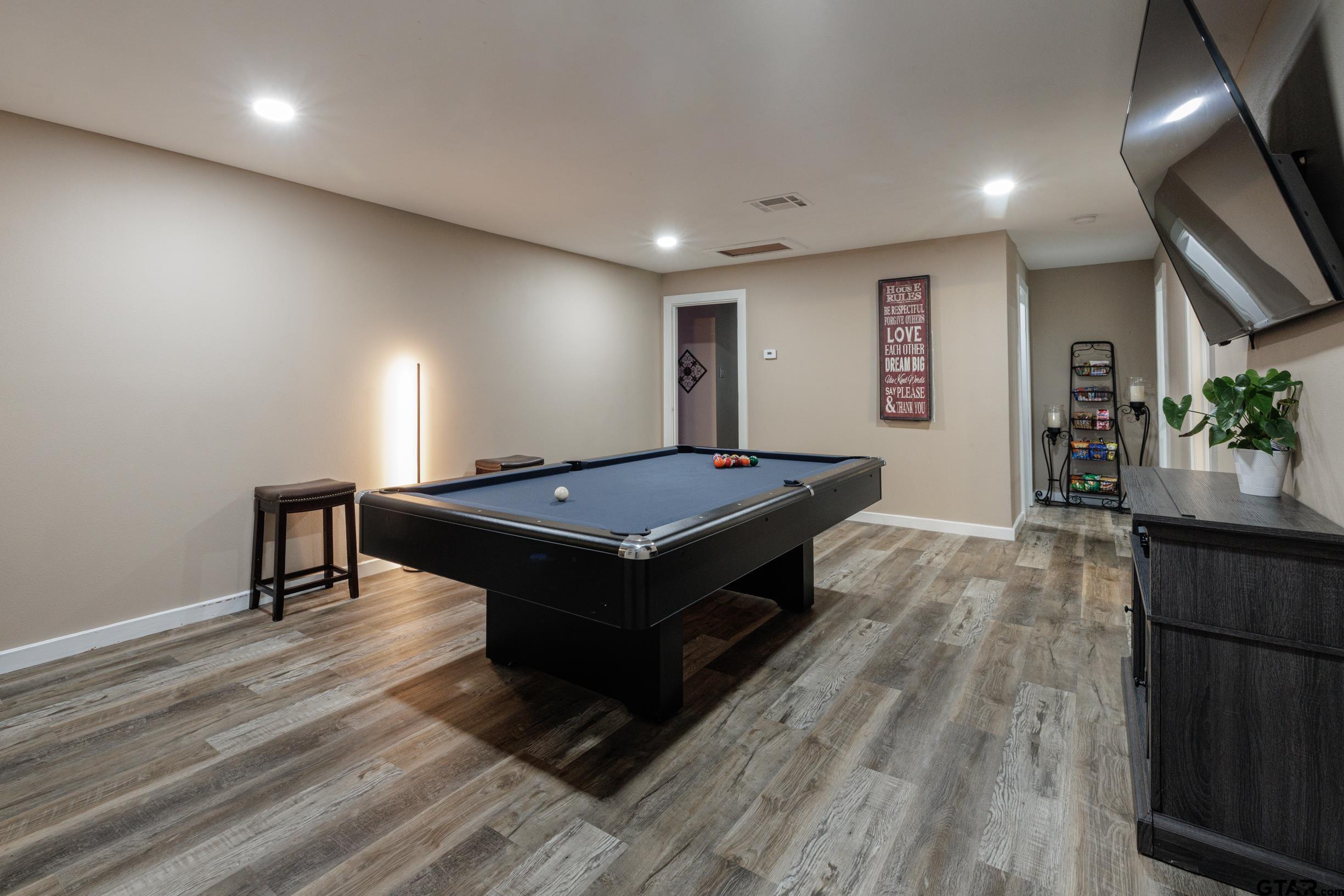 765 County Road 3410 Emory, TX 75440 - Photo 23 of 38 a living room with a table