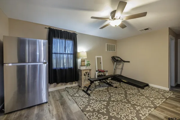a view of a room with gym equipment