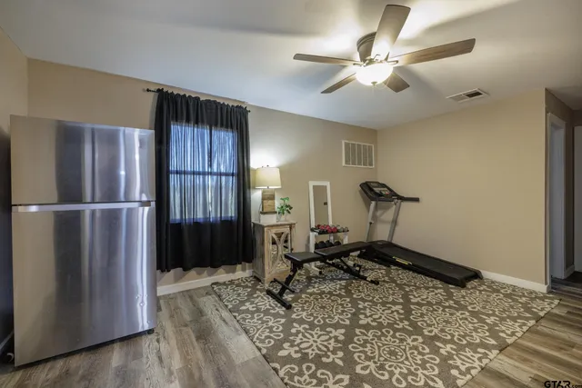 a view of a room with gym equipment