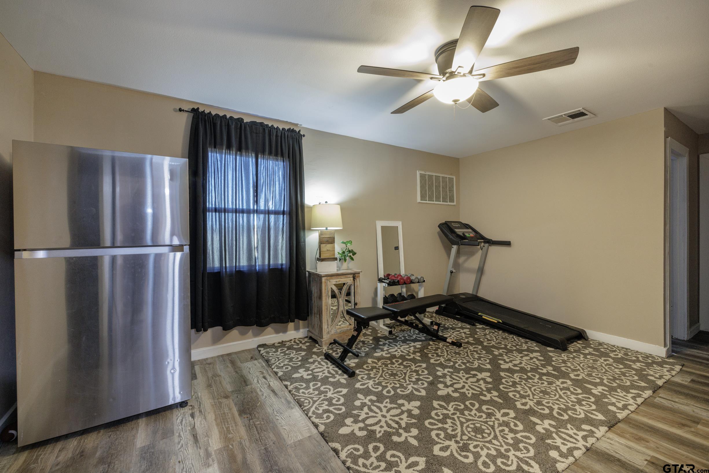 765 County Road 3410 Emory, TX 75440 - Photo 24 of 38 a view of a room with gym equipment