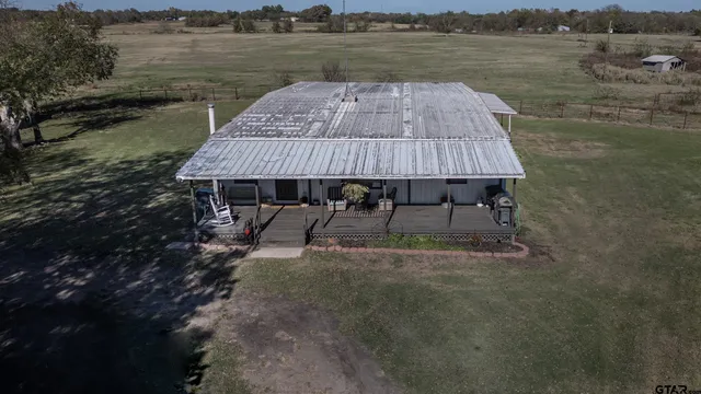 a view of a wooden floor with a lake