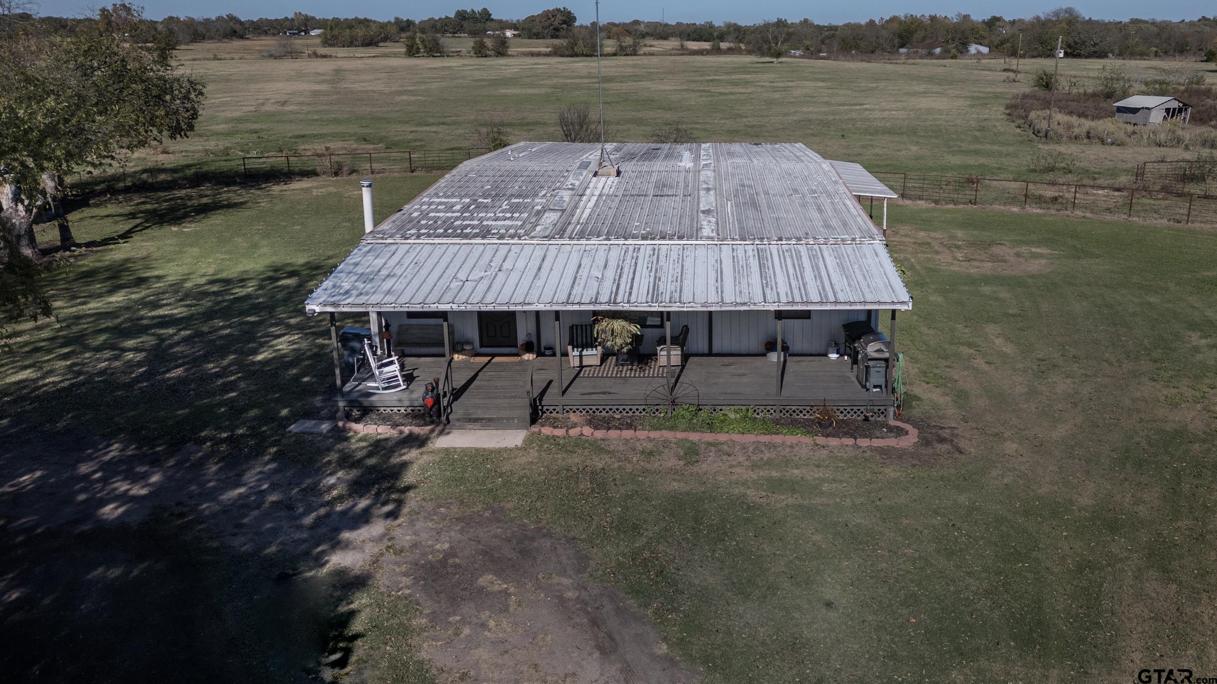 765 County Road 3410 Emory, TX 75440 - Photo 28 of 38 a view of a wooden floor with a lake