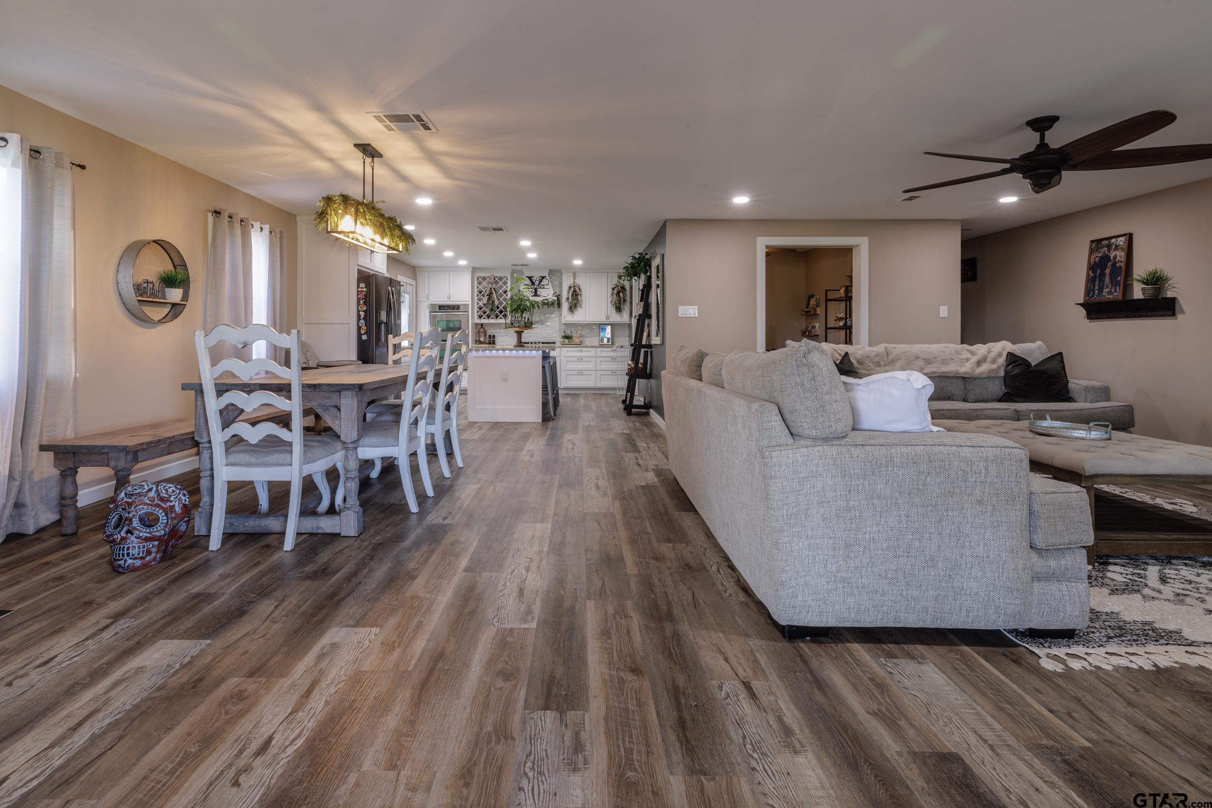 765 County Road 3410 Emory, TX 75440 - Photo 3 of 38 a living room with furniture and wooden floor