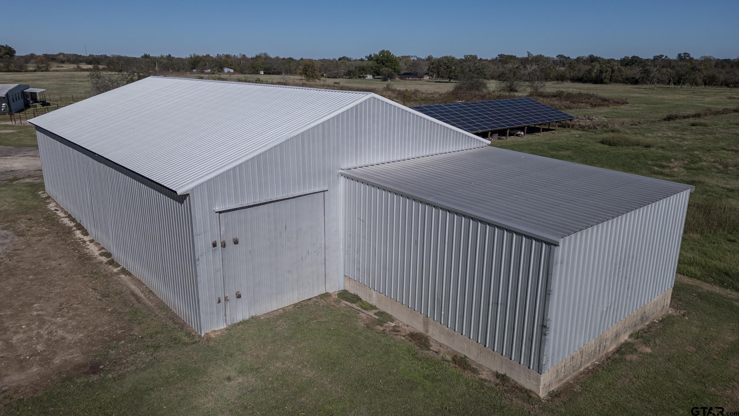 765 County Road 3410 Emory, TX 75440 - Photo 31 of 38 an aerial view of a house