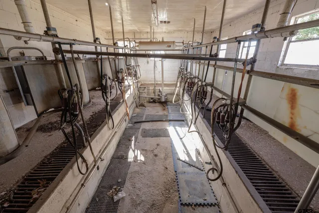 a view of a balcony with wooden floor