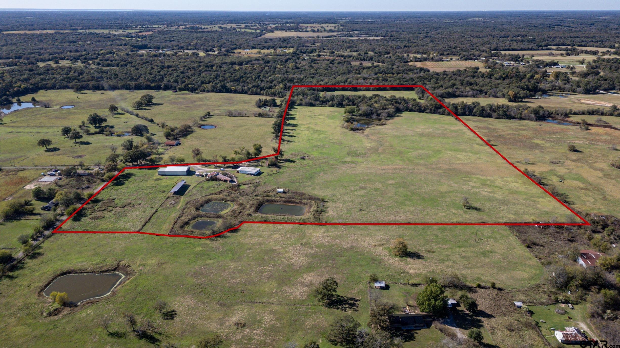 765 County Road 3410 Emory, TX 75440 - Photo 37 of 38 an aerial view of a house