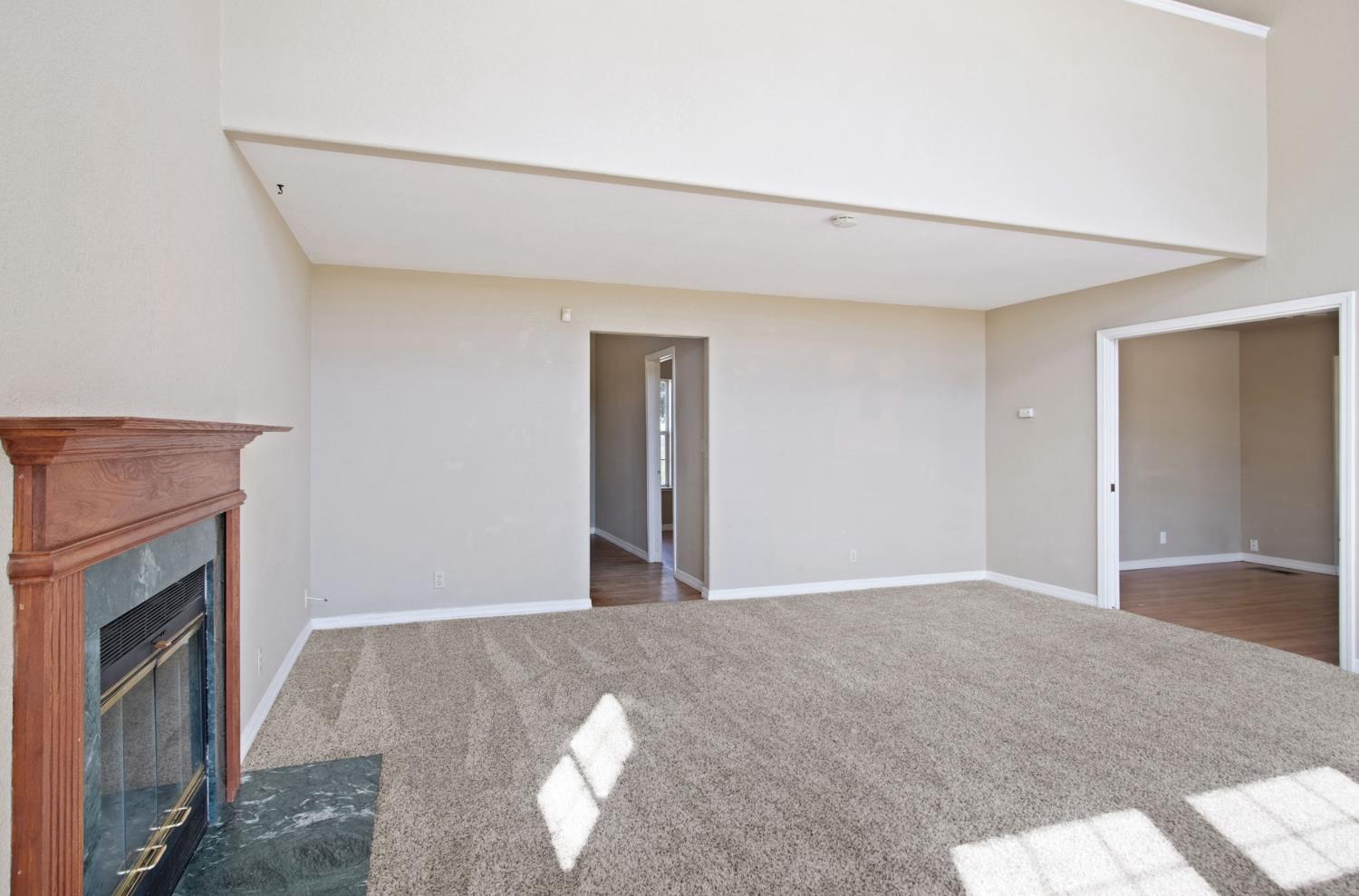 18624 Lake Road Hickman, CA 95323 - Photo 21 of 34 a view of a livingroom with a fireplace