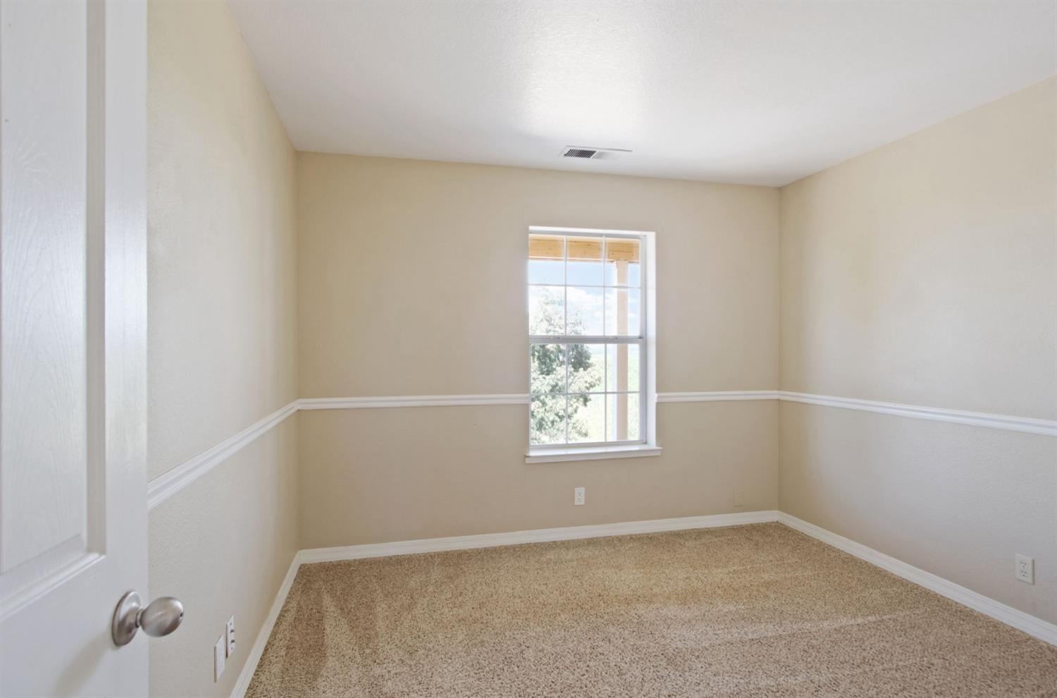 18624 Lake Road Hickman, CA 95323 - Photo 27 of 34 an empty room with a window