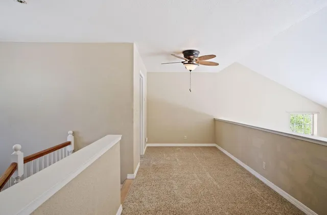 a view of a room with rack on the wall