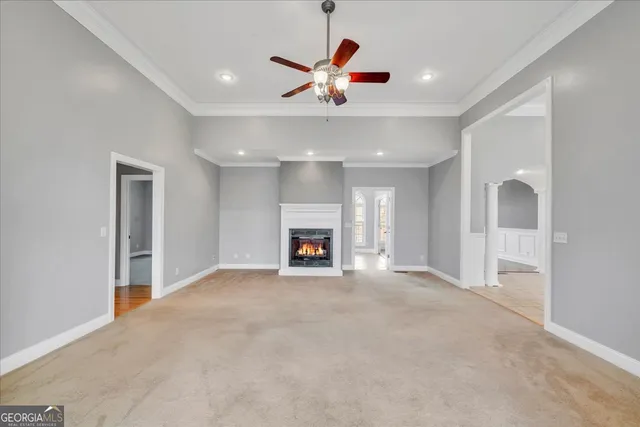 a kitchen with stainless steel appliances kitchen island granite countertop a sink and cabinets